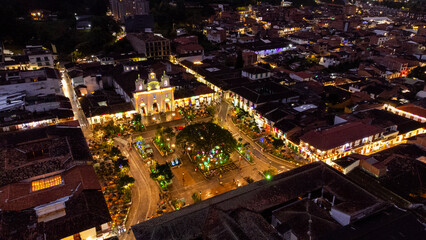 El Retiro, Antioquia - Colombia. December 19, 2025. Nighttime drone photograph of the town's historic center, where the lighting highlights the church.