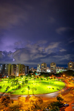 Ribeir&atilde;o Preto, Brazil. Storm over the city at night, lightning and urban park during the New Year's Eve celebrations.