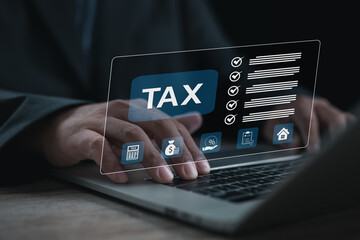 Business professional managing digital tax documents on a laptop with virtual tax interface, checklist icons, and financial symbols, representing online tax filing, compliance, accounting, and modern 