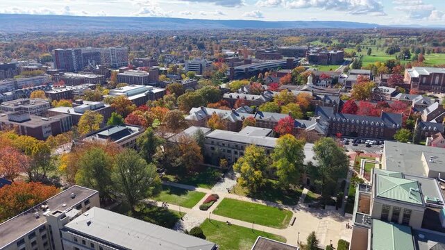 PENNSYLVANIA - 11.10.2025 - Beautiful aerial footage moving over Penn State University's autumnal campus.