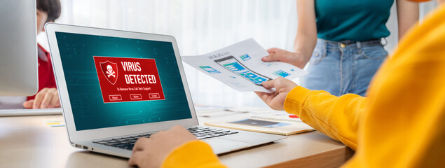 Virus warning alert on computer screen detected brisk cyber threat , hacker, computer virus and...