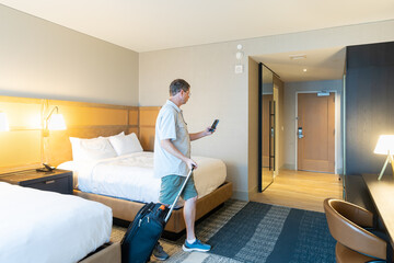 hotel guest in hotel room during business trip