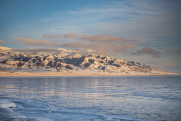 Fototapeta premium Sayram Lake in Xinjiang, China, frozen over in winter