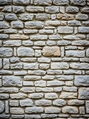 Fototapeta premium Aged stone cladding background showing texture, material and craftsmanship