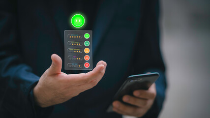 Businessman using smartphone to give five-star rating and positive feedback through virtual interface. Concept of customer satisfaction, user experience, review system, and digital feedback.