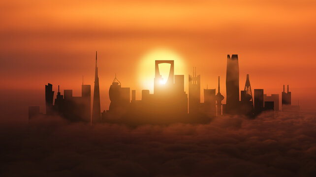 Golden Hour Cityscape Above the Clouds . Landmarks of Riyadh, Saudi Arabia emerge from the clouds as the sun sets. Technological and cultural development