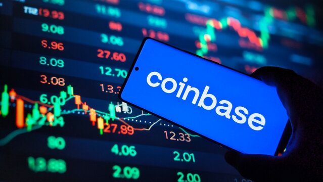 Coinbase app on smartphone with stock market data on screen