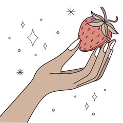 Hand holding a strawberry with sparkles