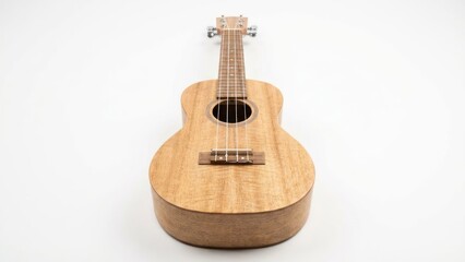 Obraz premium Light wood ukulele on white background isolated for music design needs