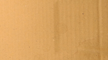 Brown carton texture for background for design and artwork. Abstract brown recycled paper background. Old Kraft paper texture box craft stripes pattern. 