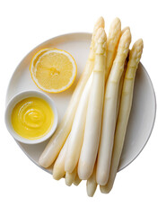Plate with white asparagus, lemon slice, yellow sauce on a black background