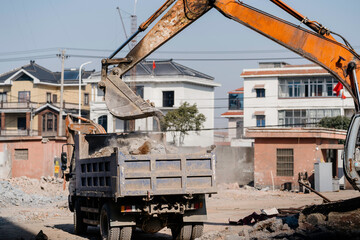 The excavator is working at the construction site.