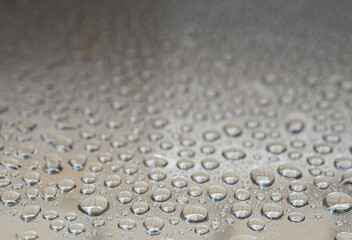 Water drops on a metal surface. Water drops on a metal surface.