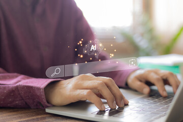 Business person using laptop with virtual AI artificial intelligence search bar. Smart technology chatbot, digital brain, machine learning, and future internet browsing concept.