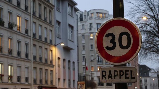 Speed limit sign in residential neighborhood, french street sign