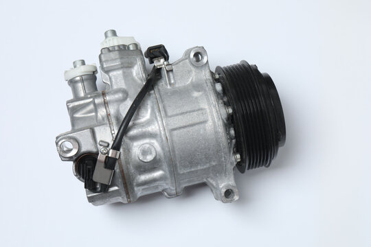 automotive air conditioning compressor on a white background