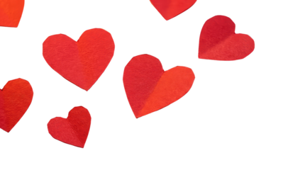 Red hearts of various sizes scattered across a plain white background creating a vibrant and cheerful display plain white background and png