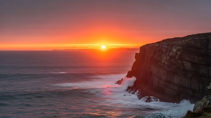 Serene sunset over ocean waves crashing against rocky cliffside