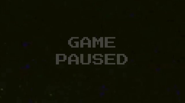 Pixelated game paused message on a dark screen. Ideal for gaming websites or blogs needing a retro gaming vibe.