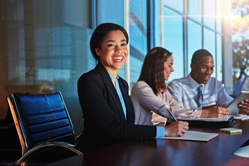 Business, laughing and portrait of woman in boardroom for company development or management. About...