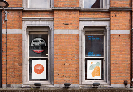Mockup of vinyl decals and posters in window in Dublin
