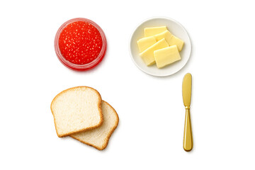 Minimalist flat lay food photography, glass jar filled with bright red salmon caviar, small white plate with thin slices of butter, two slices of white bread, and a gold butter knife arranged neatly, 