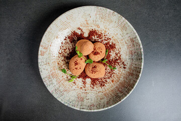 Tempting chocolate treats beautifully displayed with edible decorations and a rich texture