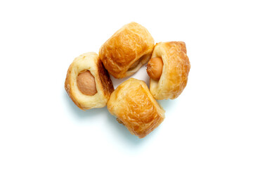 Sausage pie on isolated white background. Top view.