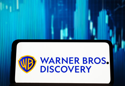In this photo illustration, Warner Bros. Discovery, Inc. logo seen displayed on a smartphone.