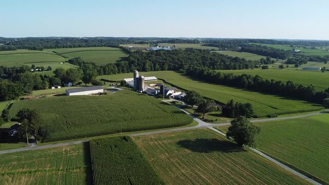 Aerial view of agricultural fields, barns and silos on farms in Cochranville, southeastern Pennsylvania