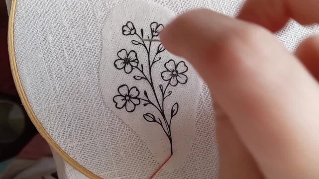 Part 1 of a tutorial on couching stitch embroidery technique. Close-up video of hands stitching the stem using couching technique, ideal for embroidery enthusiasts, DIY projects, and creative learning