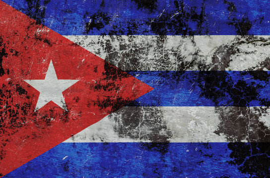 national symbol of the flag of Cuba is painted on a stone wall