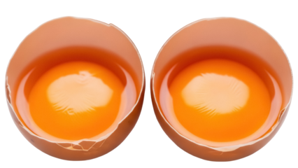 Two halves of a cracked brown chicken egg with yolk isolated PNG, fresh organic ingredient on transparent background for cooking and baking