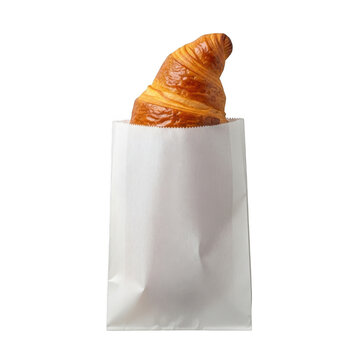 Golden croissant in white paper bag isolated on transparent background