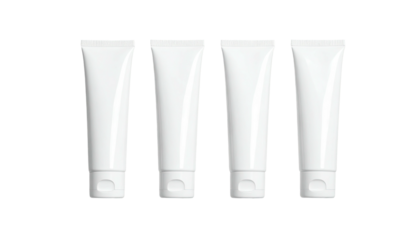 Four identical, white, unlabeled tubes arranged in a horizontal row on a black background