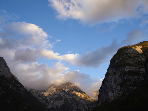 Sunlit Julian Alps mountain landscape in Triglav National Park Slovenia