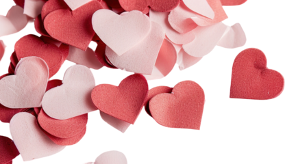 Red and pink heart confetti is scattered in a random pattern on a transparent background. These shapes can be used for various festive occasions