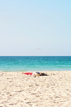 Sandy Jumeirah Beach in Dubai with turquoise sea and clear sky