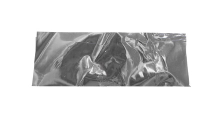 Crumpled metallic foil strip with reflective surface and irregular folds. Shiny texture and abstract
