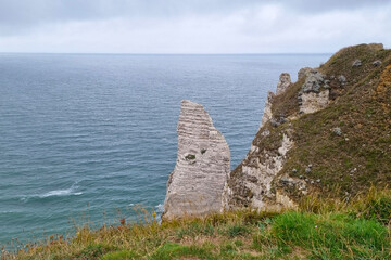 Majestic Coastal Rock Formation Overlooking the Ocean on a Cloudy Day