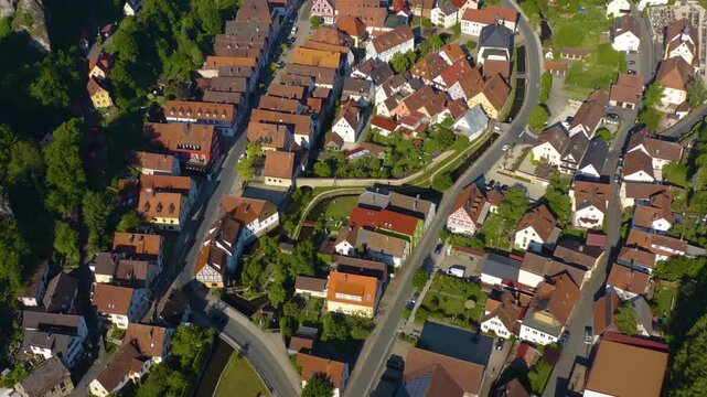 Panoramic aerial view of the old town and city Pottenstein in Germany on a sunny morning in spring. 