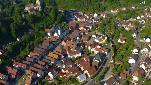 Panoramic aerial view of the old town and city Pottenstein in Germany on a sunny morning in spring. 