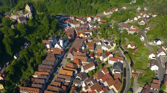 Panoramic aerial view of the old town and city Pottenstein in Germany on a sunny morning in spring. 