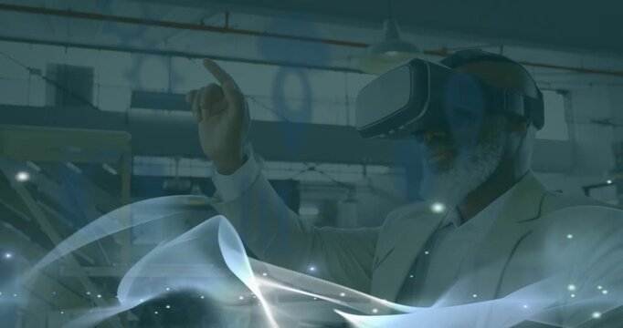 Animation of media icons over african american man using vr headset