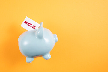 piggy bank with mortgage card	