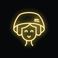 Yellow neon sign of a woman wearing a hairdressing helmet, smiling and with her eyes closed on a black background
