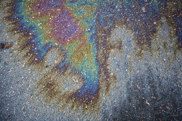 Shimmering Oil Contamination on Asphalt