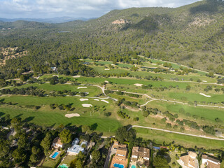 Aerial view, Spain, Balearic Islands, Mallorca, Capdepera, Cuevas de Arta and Platja de Canyamel with golf course, sand bunker, green, golfer