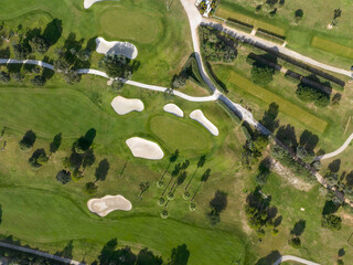 Aerial view, Spain, Balearic Islands, Mallorca, Capdepera, Cuevas de Arta and Platja de Canyamel with golf course, sand bunker, green, golfer