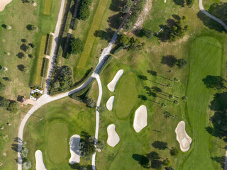 Aerial view, Spain, Balearic Islands, Mallorca, Capdepera, Cuevas de Arta and Platja de Canyamel with golf course, sand bunker, green, golfer